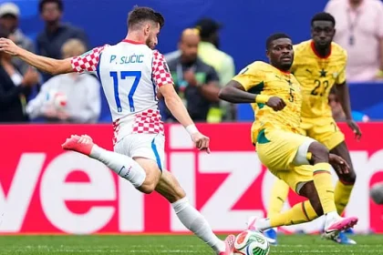 Croatia players celebrate Nikola Vlašić's late winning goal against Ghana as England also sealed qualification from Group L.