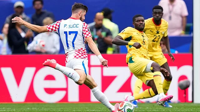 Croatia players celebrate Nikola Vlašić's late winning goal against Ghana as England also sealed qualification from Group L.
