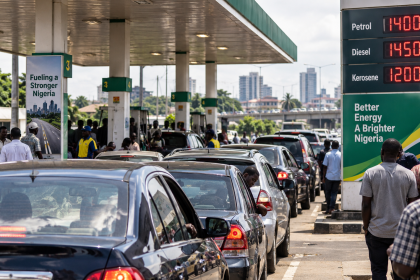 Nigerian motorists queue at a petrol station amid rising fuel prices and economic hardship.