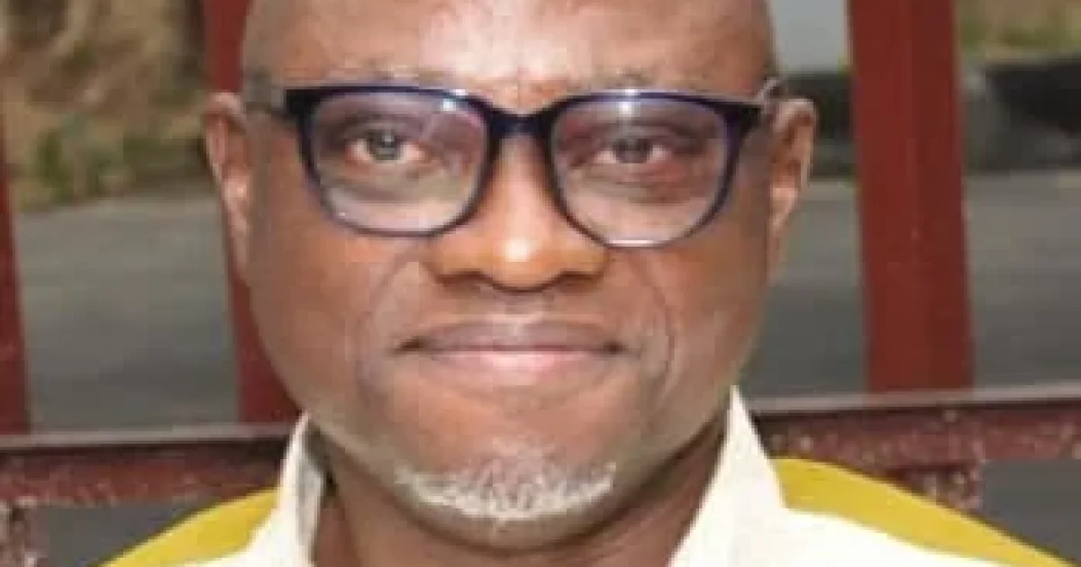 Portrait of Chris Echikwu, a Nigerian commodity market expert and former General Manager for Corporate Communications and Strategy at the Nigeria Commodity Exchange, photographed in a professional setting.