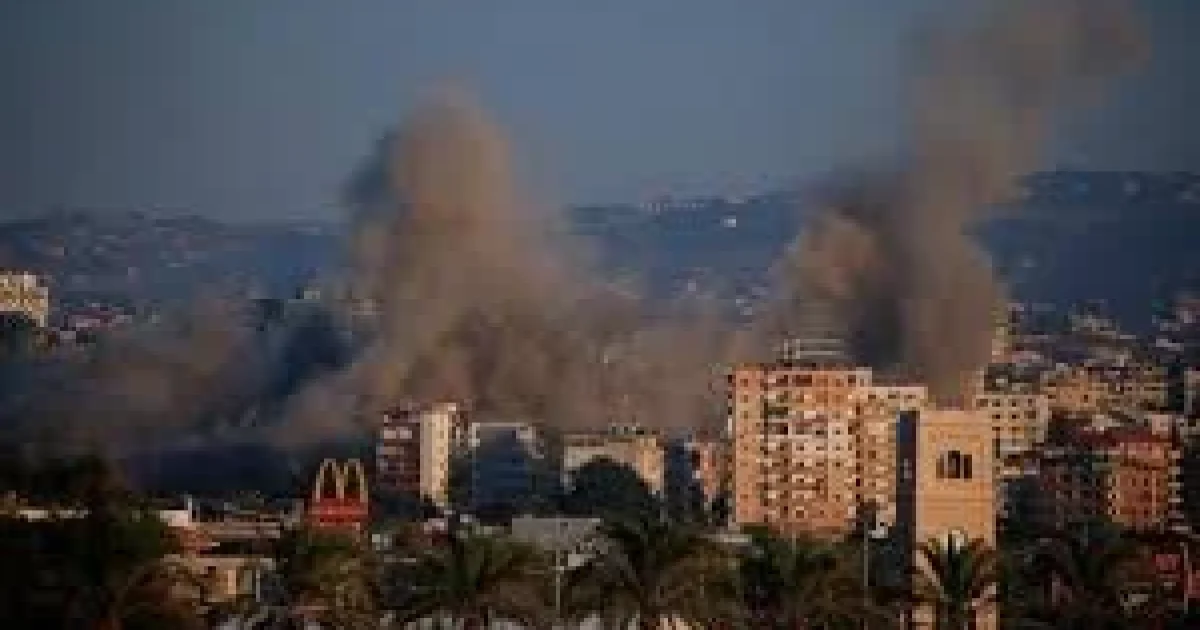 Smoke rises after Israeli airstrikes hit a highway near Beirut airport road in Lebanon during escalating regional tensions.