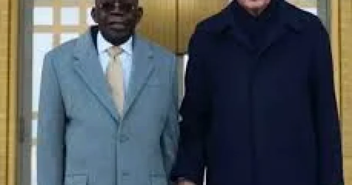 President Tinubu being held by the wrist by his host, President Recep Tayyib Erdogan of Turkiye